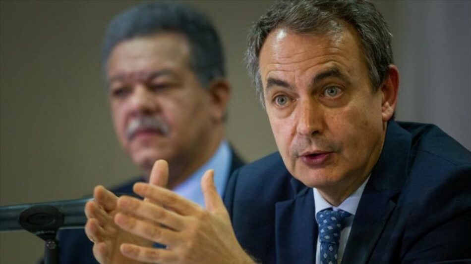 Zapatero aboga por diálogo en Venezuela y Capriles le insta a que vea la realidad que vive el país